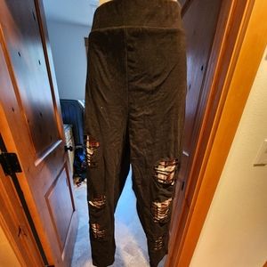 Torrid black leggings with plaid grunge look